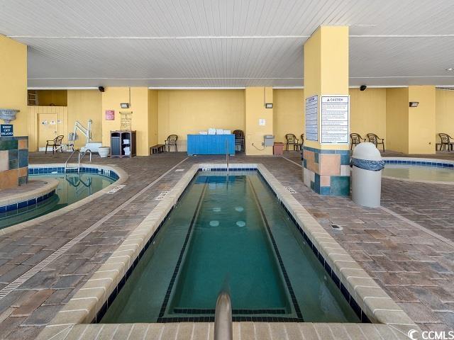2000 North Ocean Boulevard, Unit 1612 Myrtle Beach, SC 29577 - Photo 20 of 21 View of swimming pool featuring a patio area