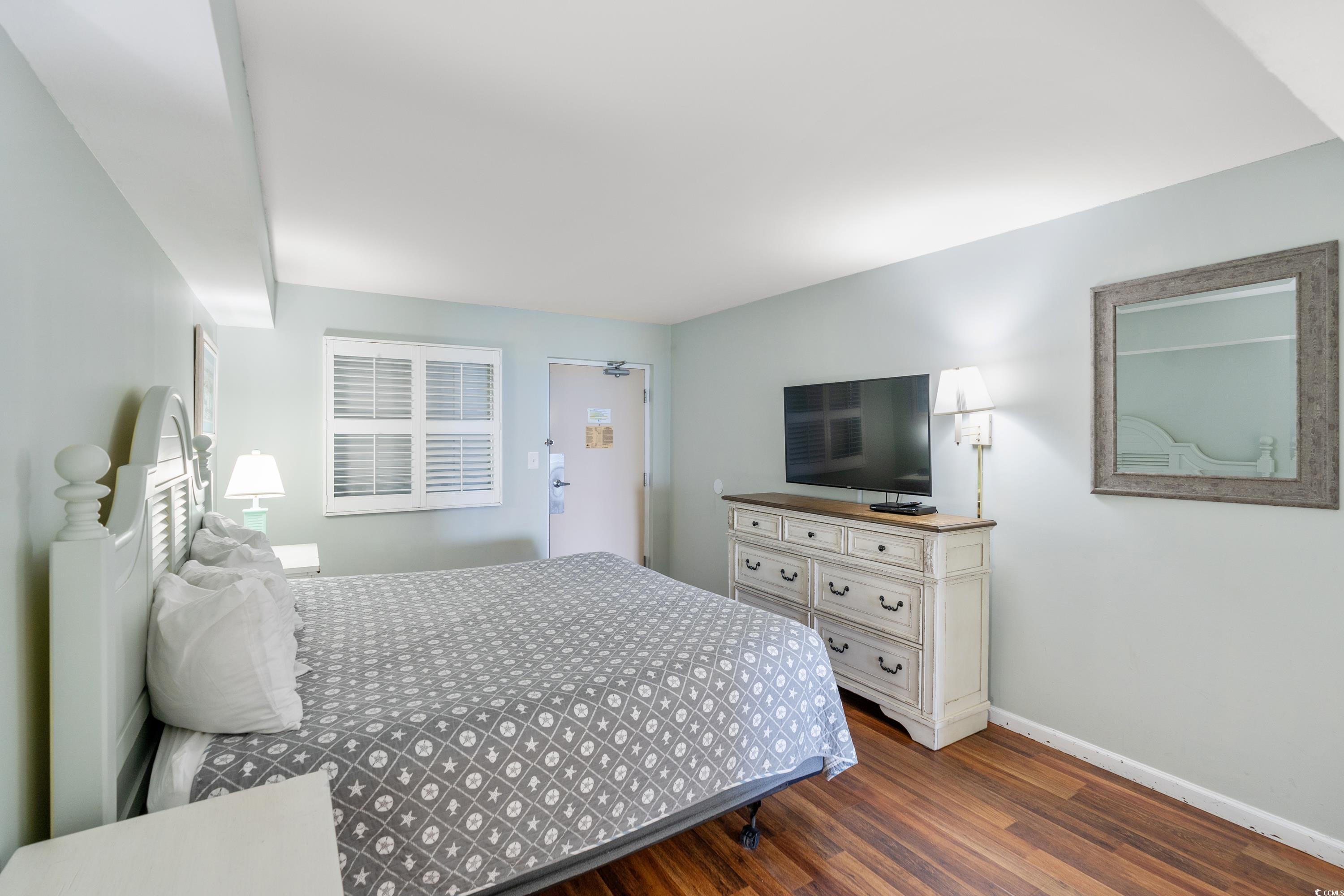 2000 North Ocean Boulevard, Unit 1612 Myrtle Beach, SC 29577 - Photo 3 of 21 Bedroom with dark hardwood / wood-style flooring