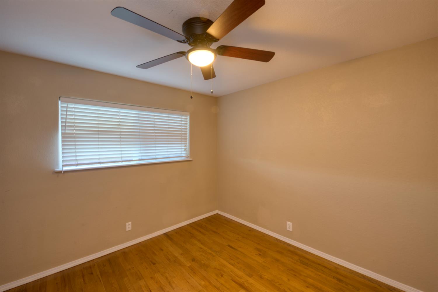 902 Waller Street Gustine, CA 95322 - Photo 26 of 32 an empty room with a window