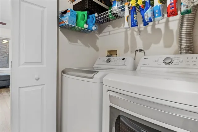a view of balcony with furniture