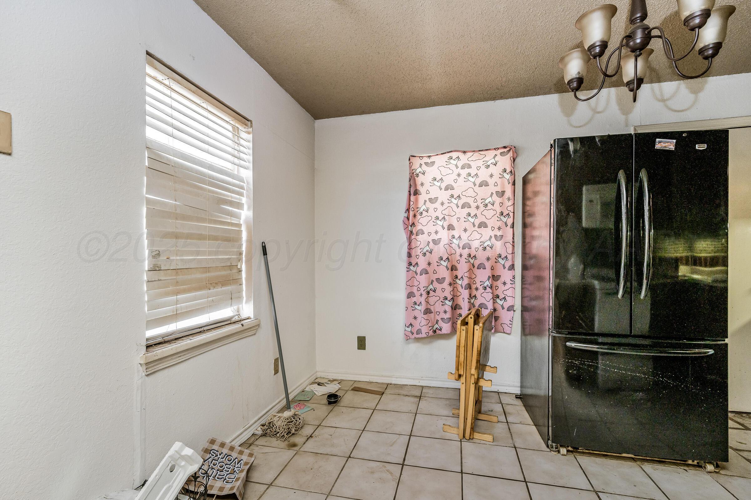 4317 South Polk Street Amarillo, TX 79110 - Photo 6 of 13 a view of an entryway with a door