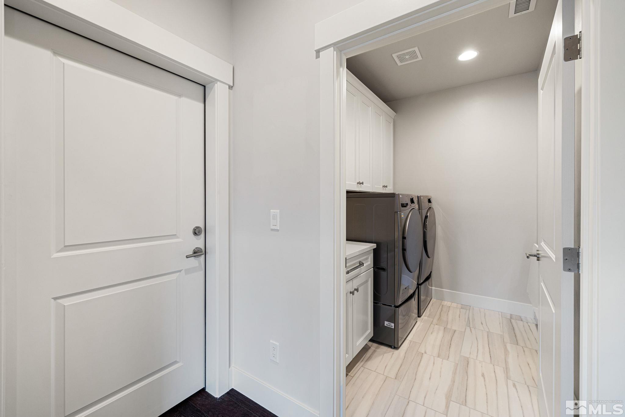 4005 Whispering Pine Loop Reno, NV 89519 - Photo 24 of 39 a view of walk in closet with clothes and shoes