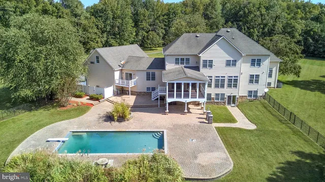 a view of a lake with a yard