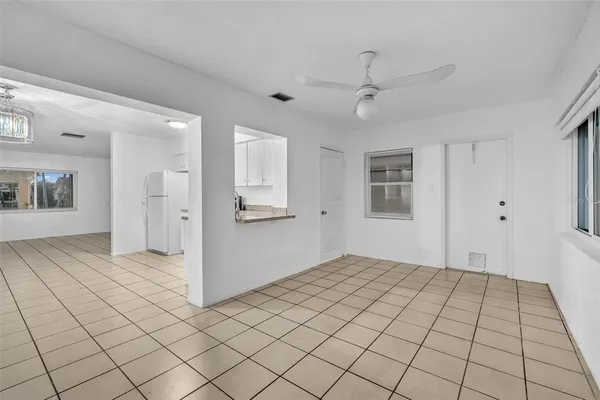 a view of an empty room and window