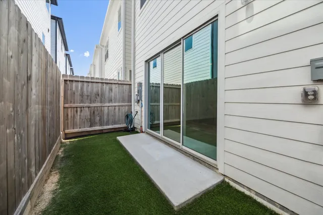 a view of backyard with green space