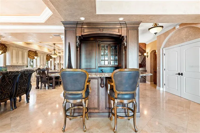 a view of a patio with a table chairs and a patio
