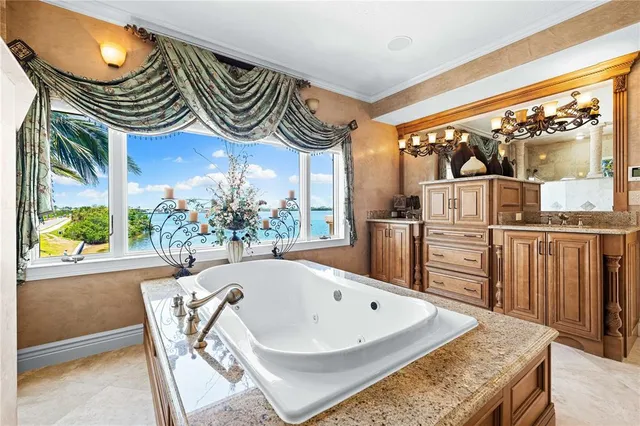 a bathroom with a sink a toilet and a shower