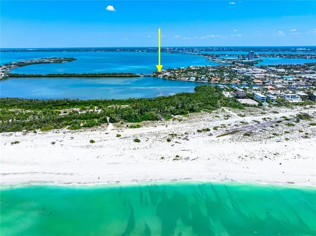 a living room with furniture a rug and a flat screen tv