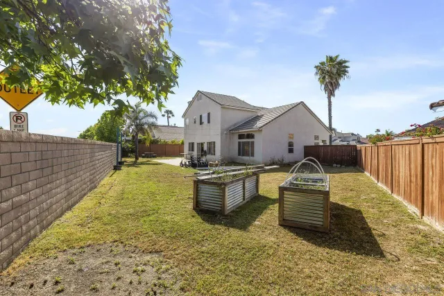 a view of a house with swimming pool