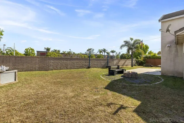 a view of a yard with an outdoor space