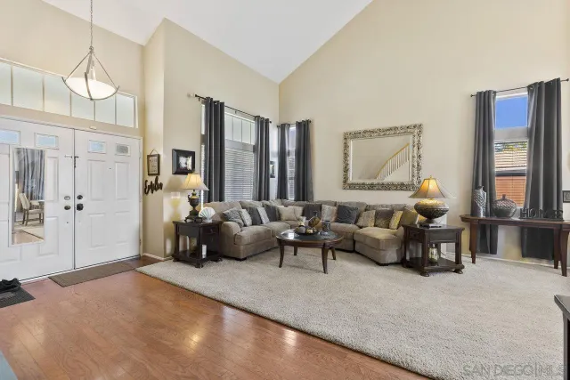 a living room with furniture window and a lamp