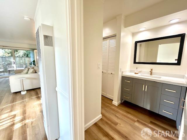 175 Red Rock Way, Unit 101K San Francisco, CA 94131 - Photo 13 of 25 a bathroom with a double vanity sink and mirror