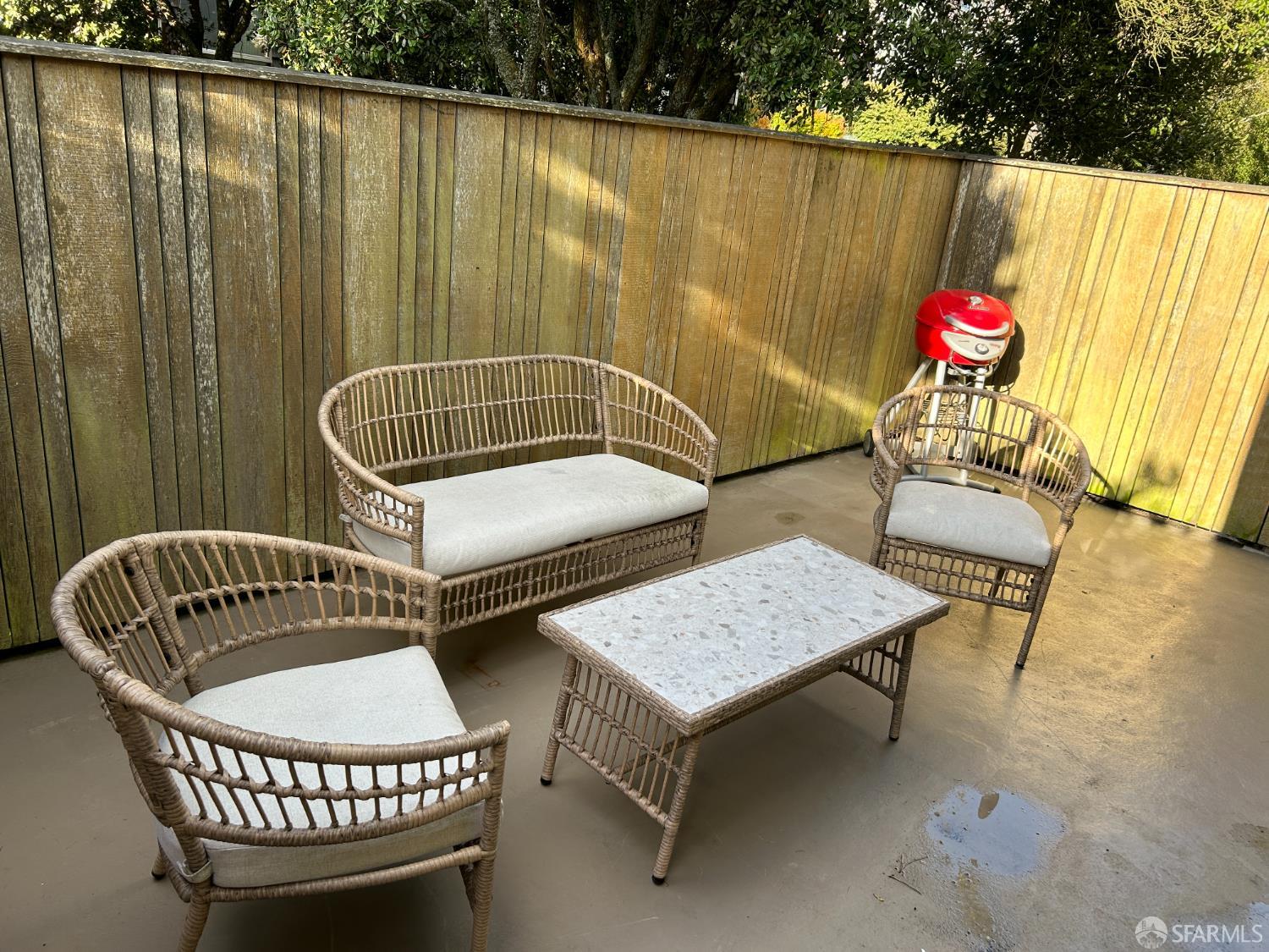 175 Red Rock Way, Unit 101K San Francisco, CA 94131 - Photo 15 of 25 a patio with a table and chairs