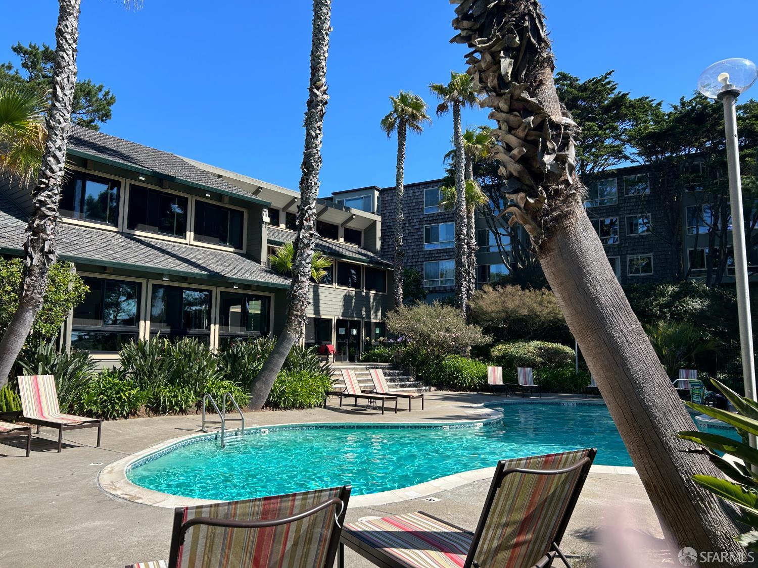 175 Red Rock Way, Unit 101K San Francisco, CA 94131 - Photo 20 of 25 a view of a house with backyard porch and sitting area