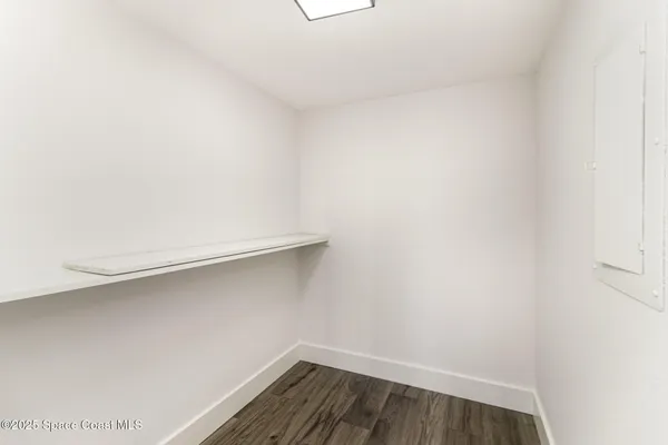 a view of small space with racks on the wall