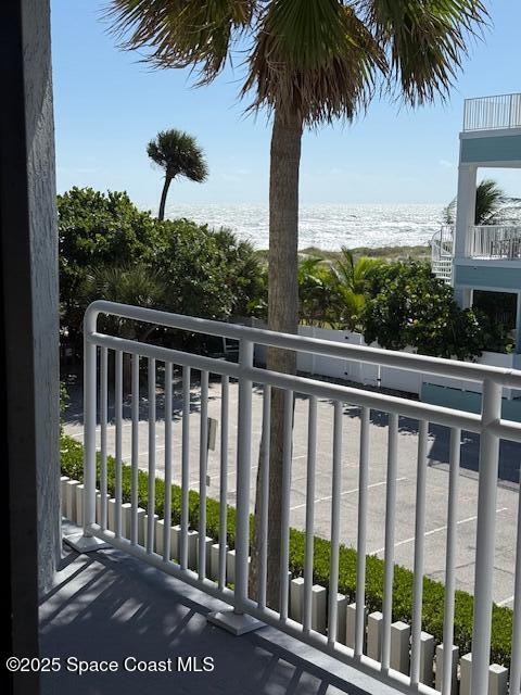 85 South Atlantic Avenue, Unit 306 Cocoa Beach, FL 32931 - Photo 25 of 41 a view of a yard with a palm tree