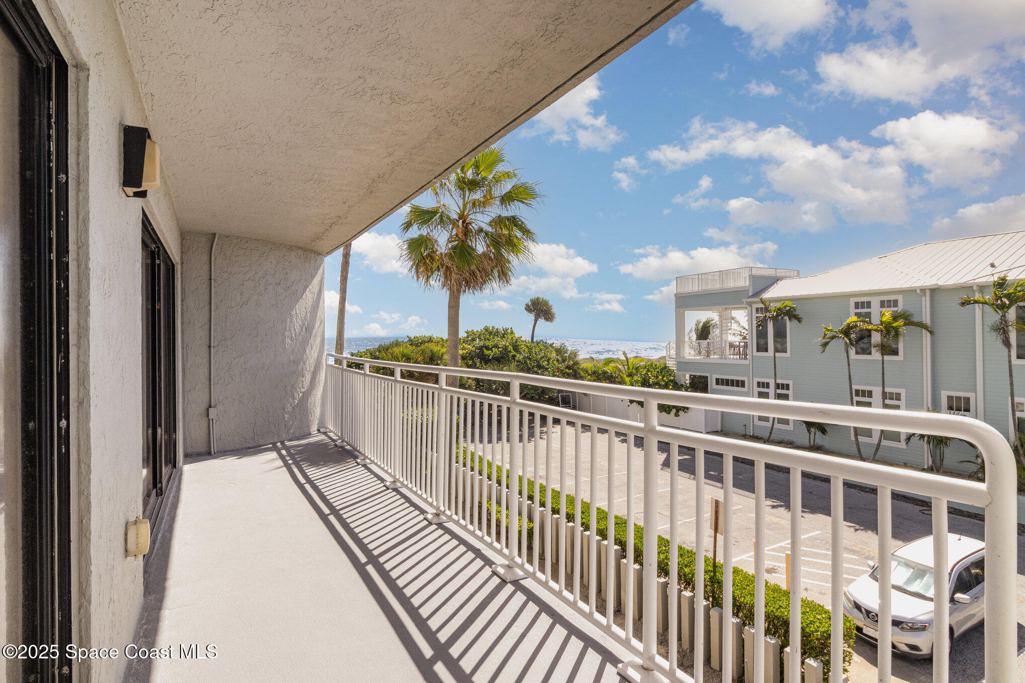85 South Atlantic Avenue, Unit 306 Cocoa Beach, FL 32931 - Photo 26 of 41 a view of a balcony with city view