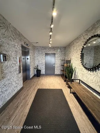 a view of a living room and bathroom