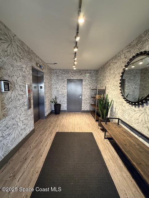 85 South Atlantic Avenue, Unit 306 Cocoa Beach, FL 32931 - Photo 3 of 41 a view of a living room and bathroom