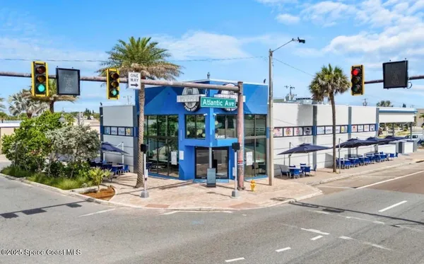 a view of street with sitting area
