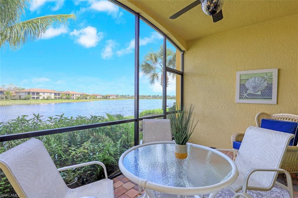 9533 Avellino Way, Unit 2916 Naples, FL 34113 - Photo 7 of 23 a view of a chair and table in the balcony