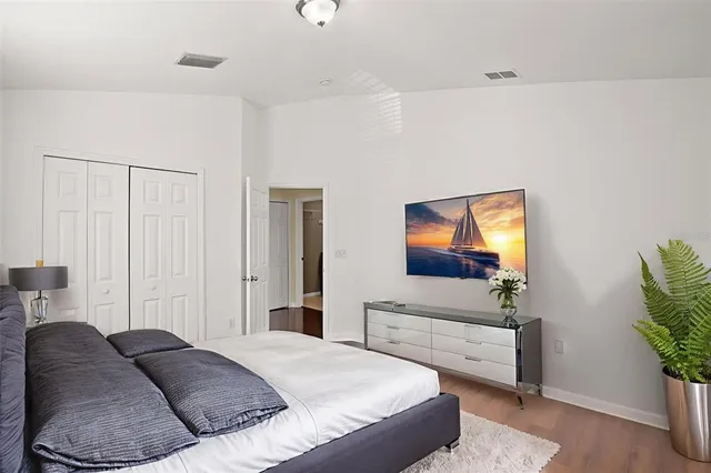 a living room with a couch and a flat screen tv