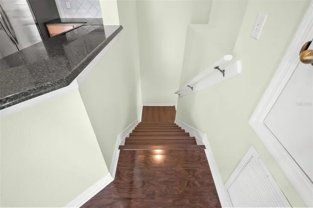 a view of entryway and kitchen