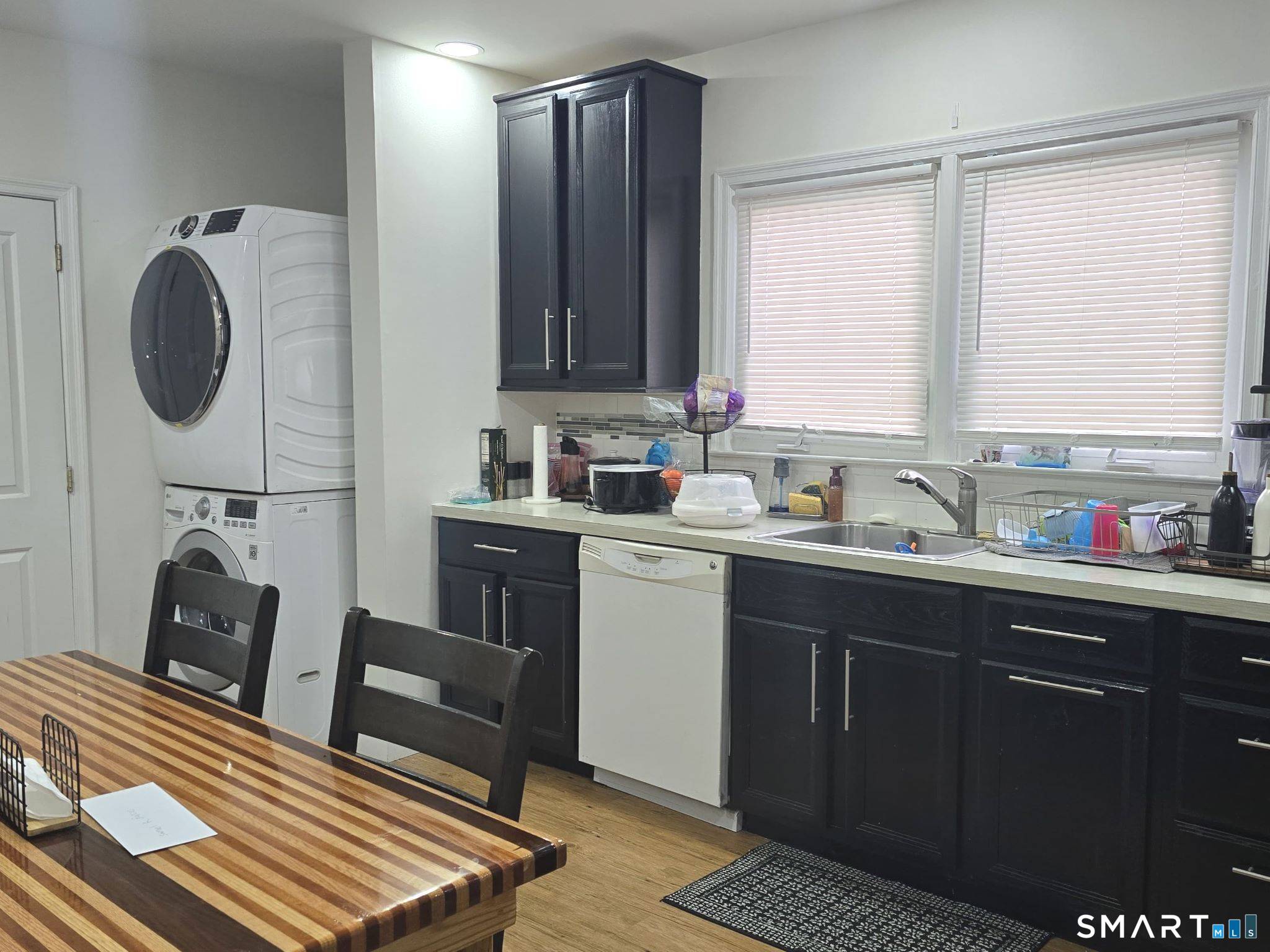 73 Rippowam Road Stamford, CT 06902 - Photo 13 of 19 a kitchen with a sink cabinets and window