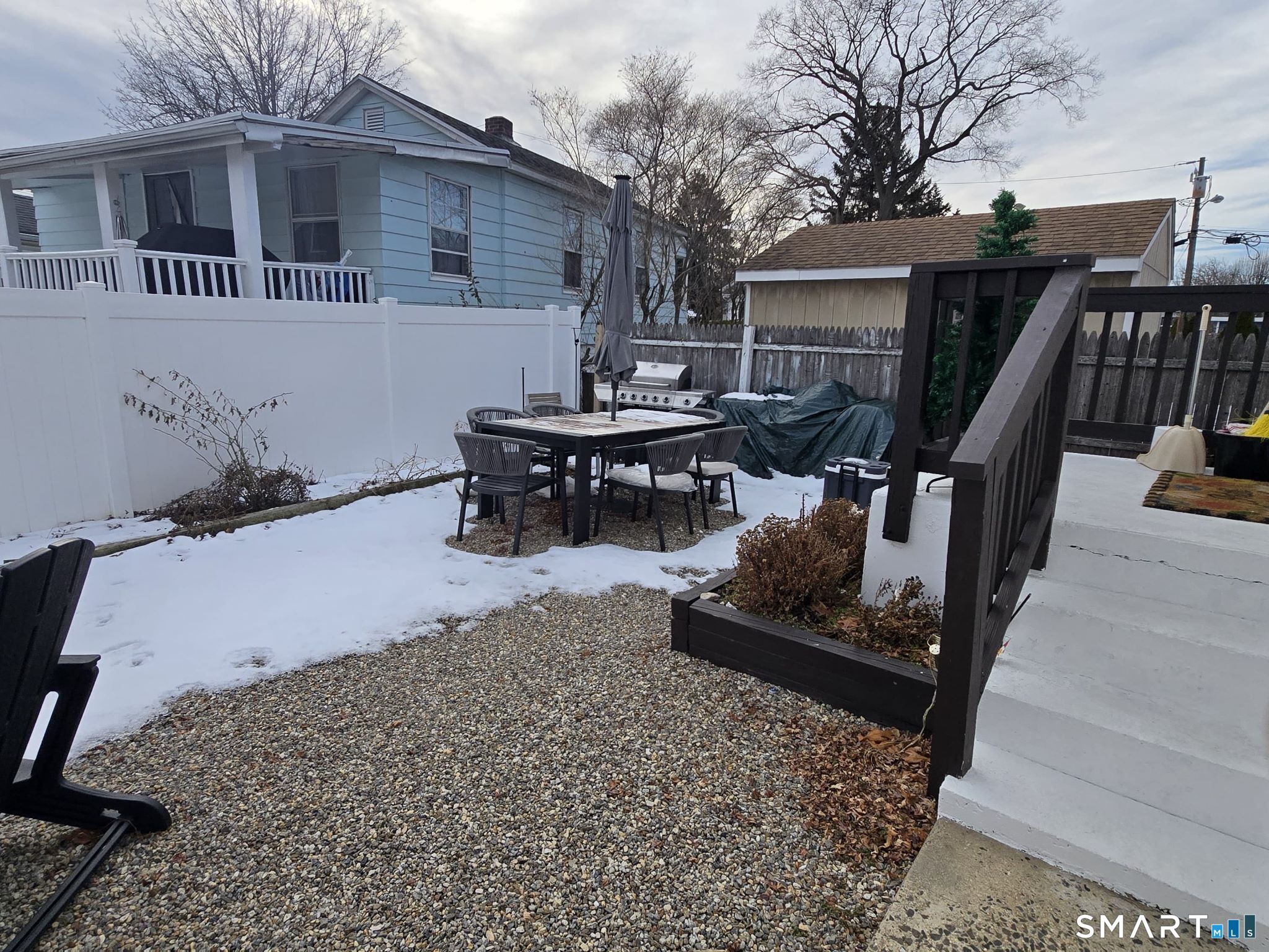 73 Rippowam Road Stamford, CT 06902 - Photo 17 of 19 a view of a house with backyard and sitting area