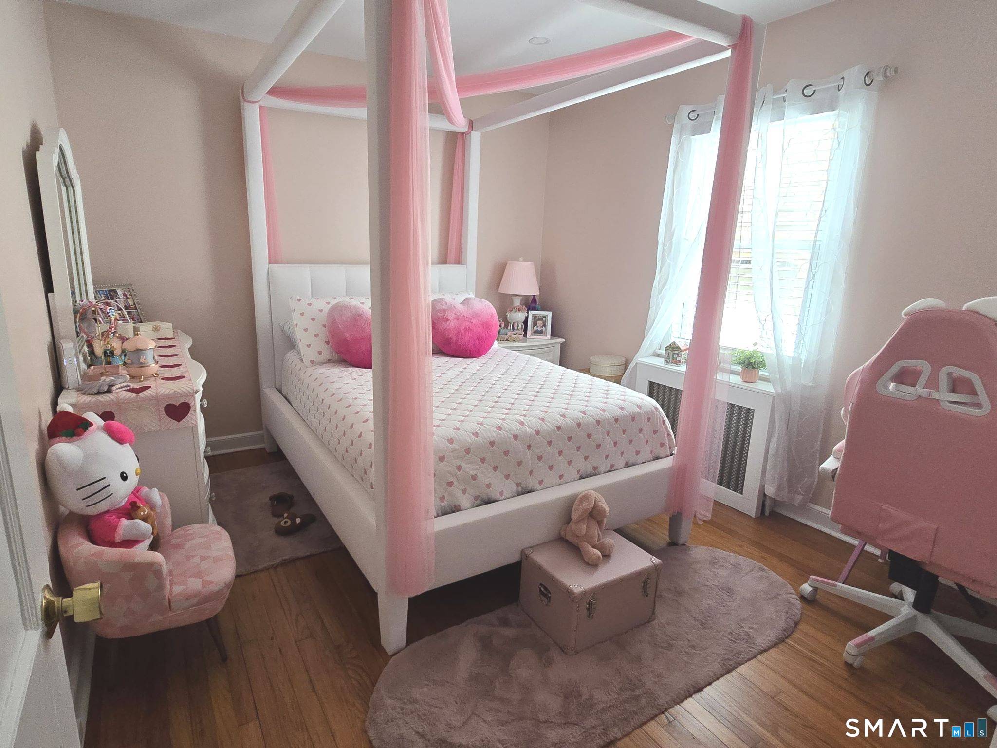 73 Rippowam Road Stamford, CT 06902 - Photo 9 of 19 a bedroom with a bed and wooden floor