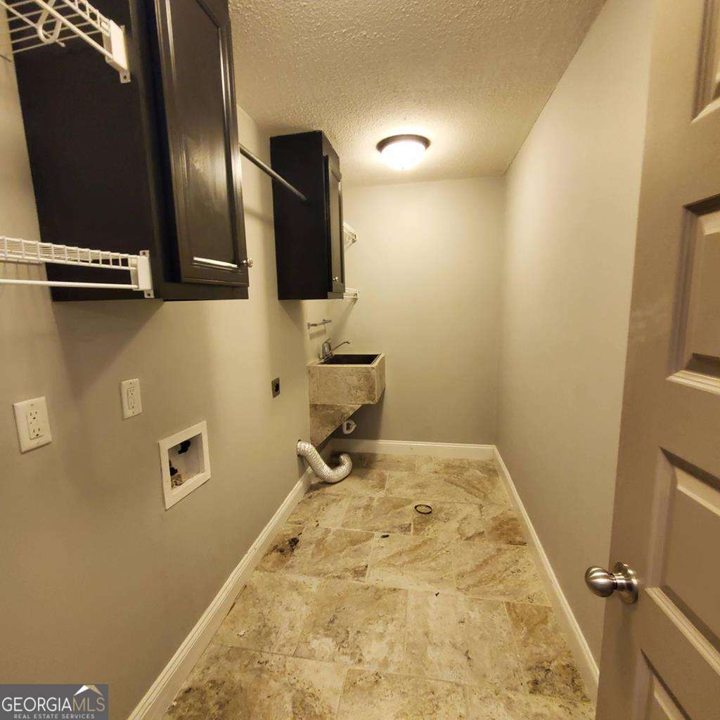 5255 Carlton Ridge Circle Hahira, GA 31632 - Photo 19 of 21 a bathroom with a sink