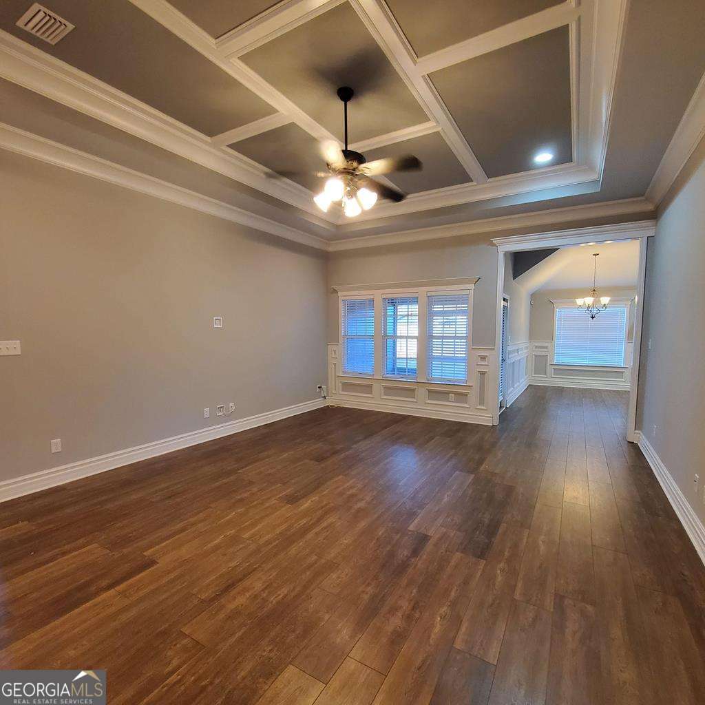 5255 Carlton Ridge Circle Hahira, GA 31632 - Photo 2 of 21 a view of an empty room with wooden floor and a window