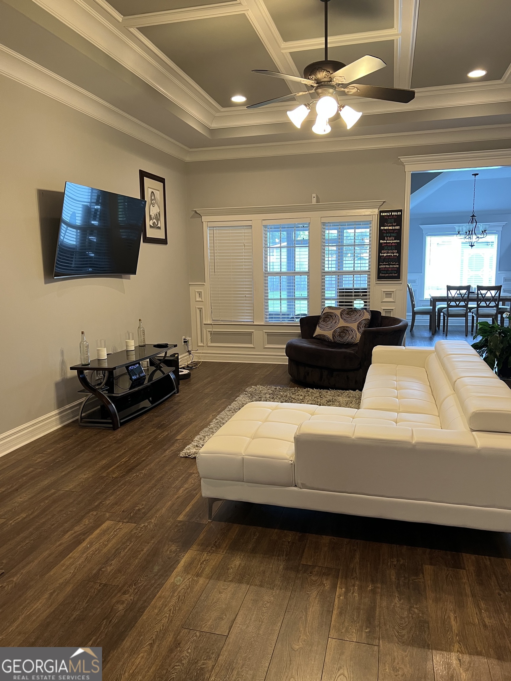 5255 Carlton Ridge Circle Hahira, GA 31632 - Photo 3 of 21 a living room with furniture and a flat screen tv