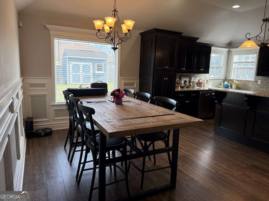 5255 Carlton Ridge Circle Hahira, GA 31632 - Photo 7 of 21 a view of a dining room with furniture window and wooden floor