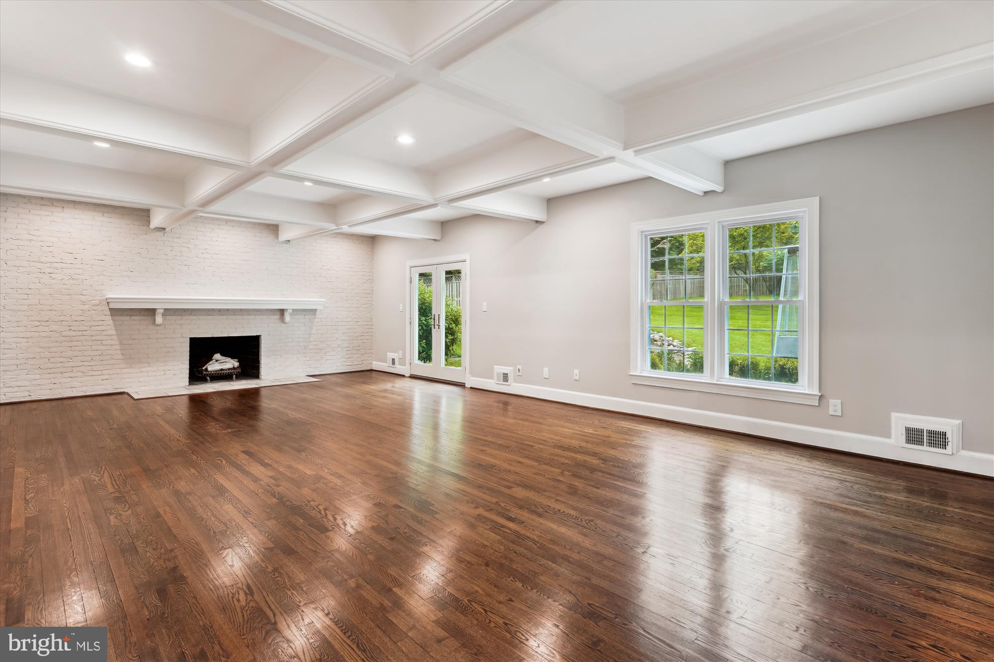 9801 Hall Road Potomac, MD 20854 - Photo 21 of 79 an empty room with wooden floor and a window