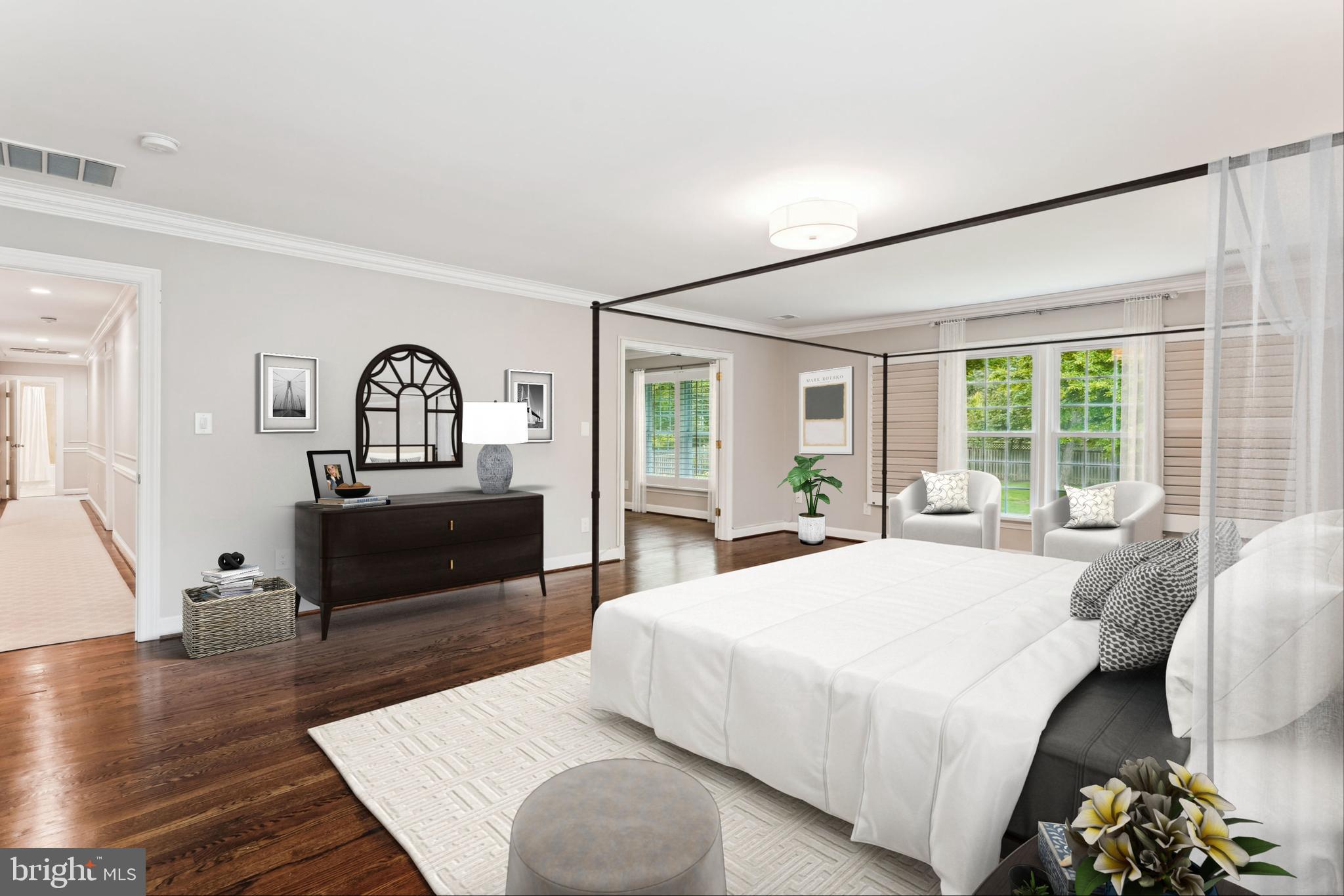 9801 Hall Road Potomac, MD 20854 - Photo 29 of 79 a bedroom with a bed and wooden floor