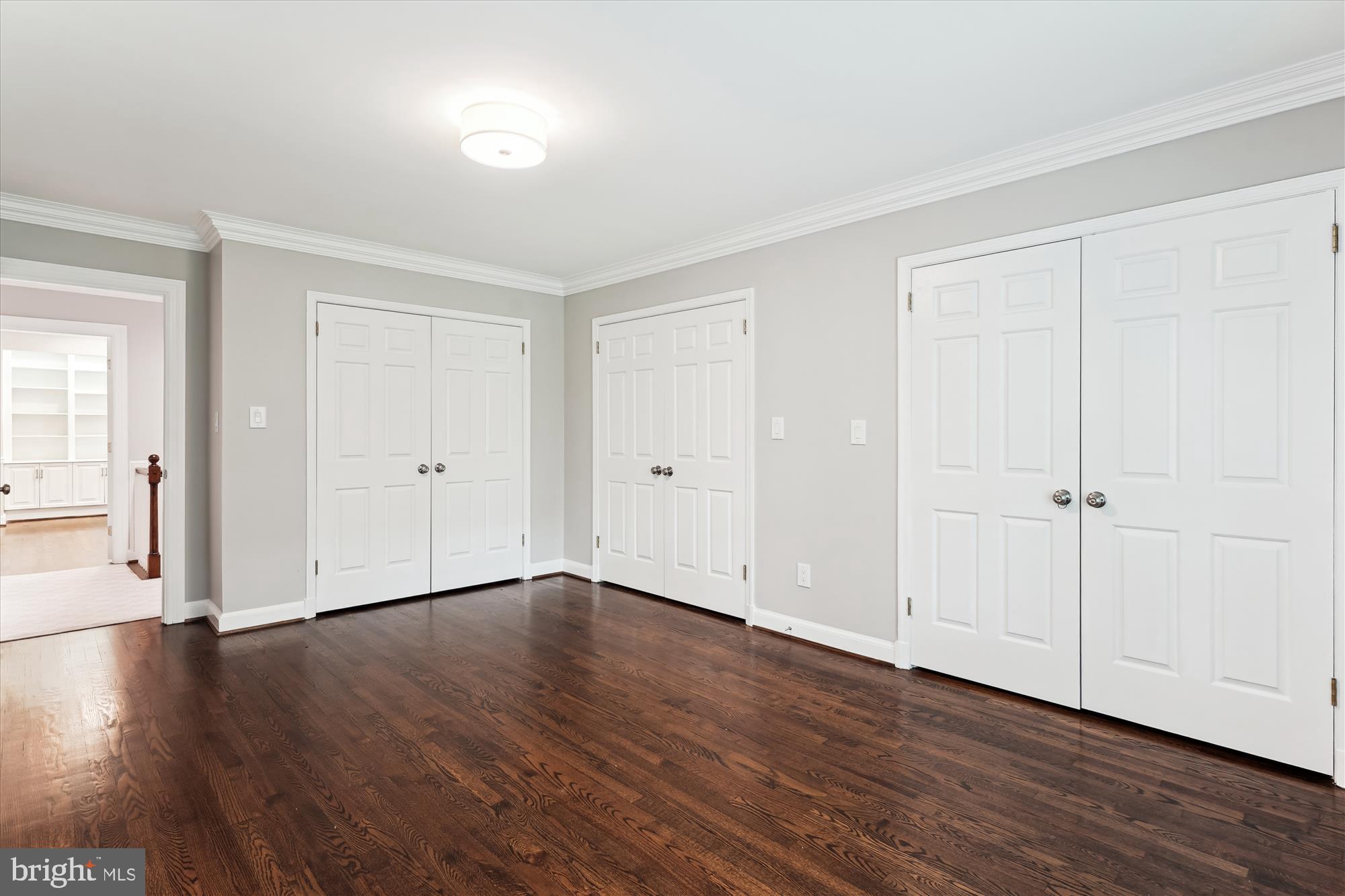 9801 Hall Road Potomac, MD 20854 - Photo 32 of 79 a view of an empty room with wooden floor