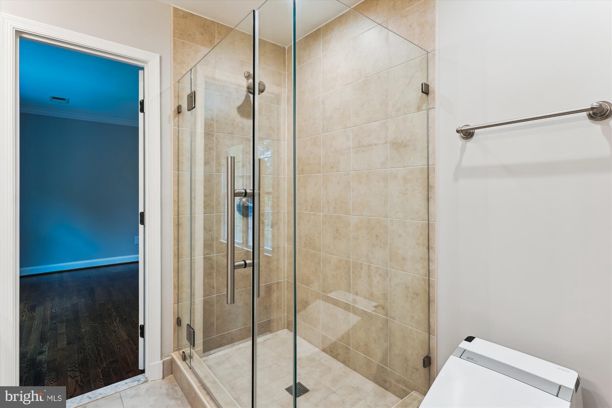 9801 Hall Road Potomac, MD 20854 - Photo 41 of 79 a bathroom with a glass shower door