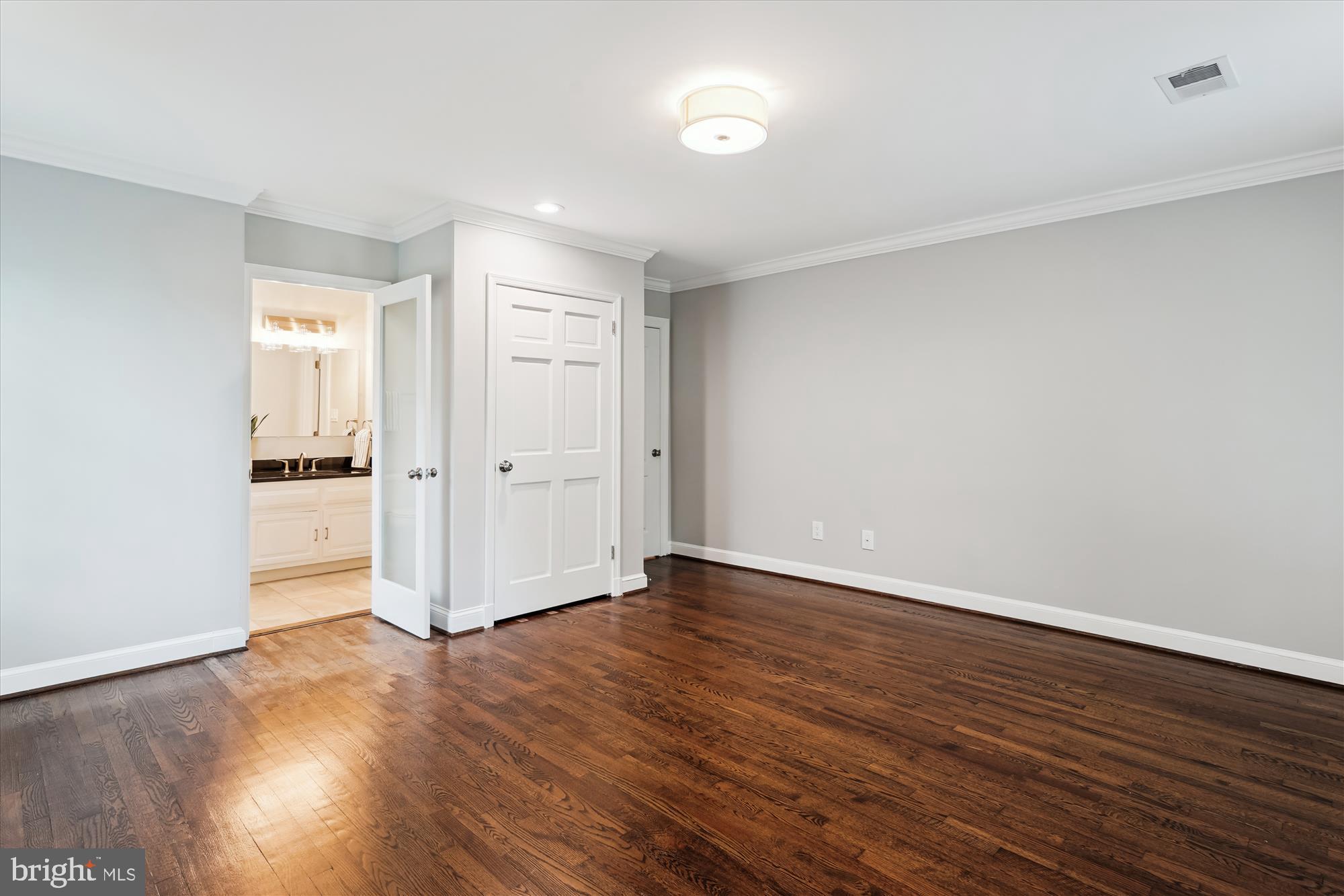 9801 Hall Road Potomac, MD 20854 - Photo 47 of 79 a view of an empty room with wooden floor
