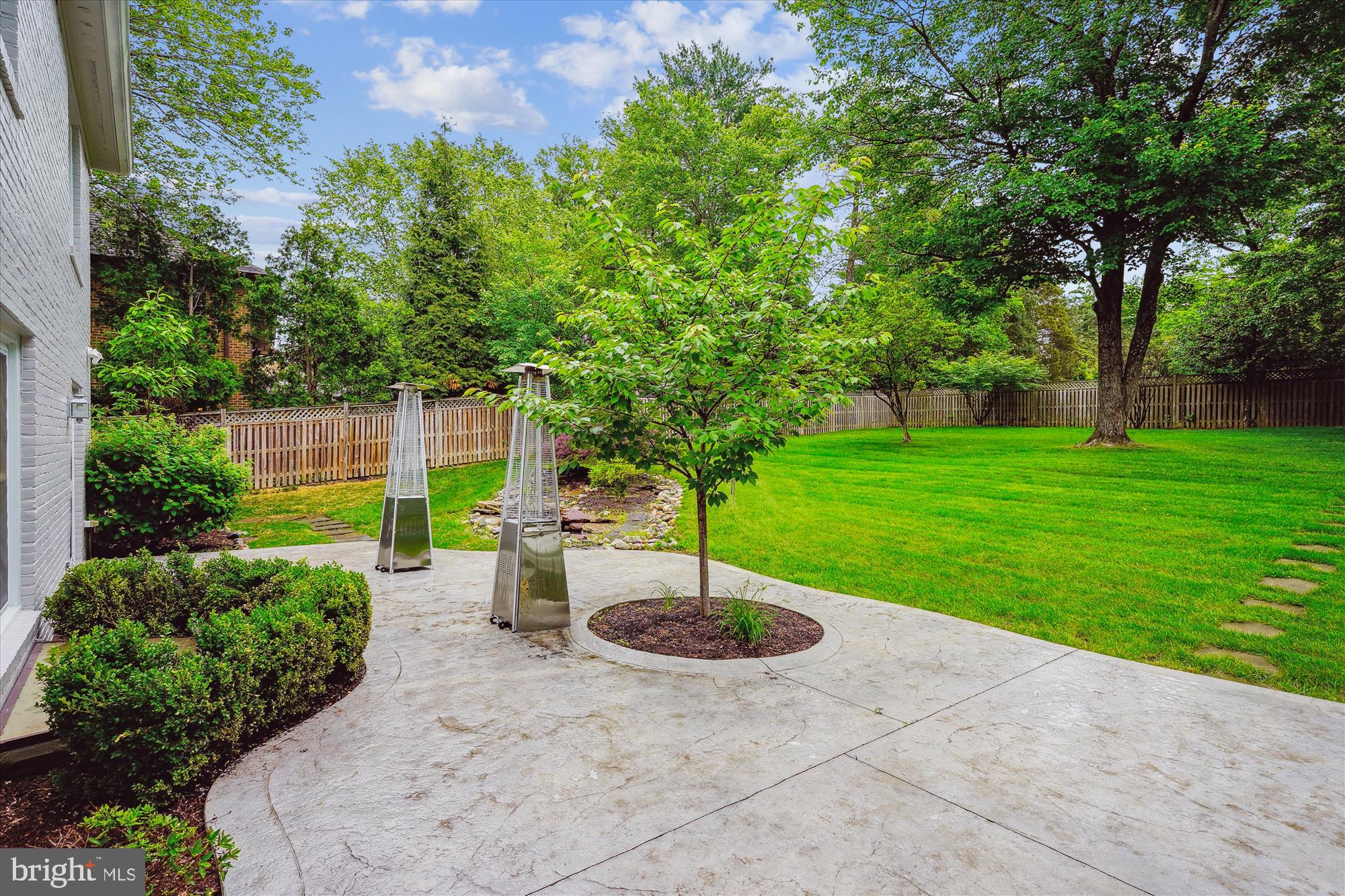 9801 Hall Road Potomac, MD 20854 - Photo 61 of 79 a view of a backyard with a fountain