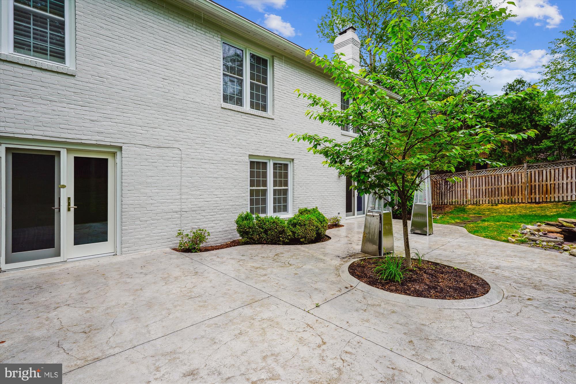 9801 Hall Road Potomac, MD 20854 - Photo 63 of 79 a front view of a house with garden