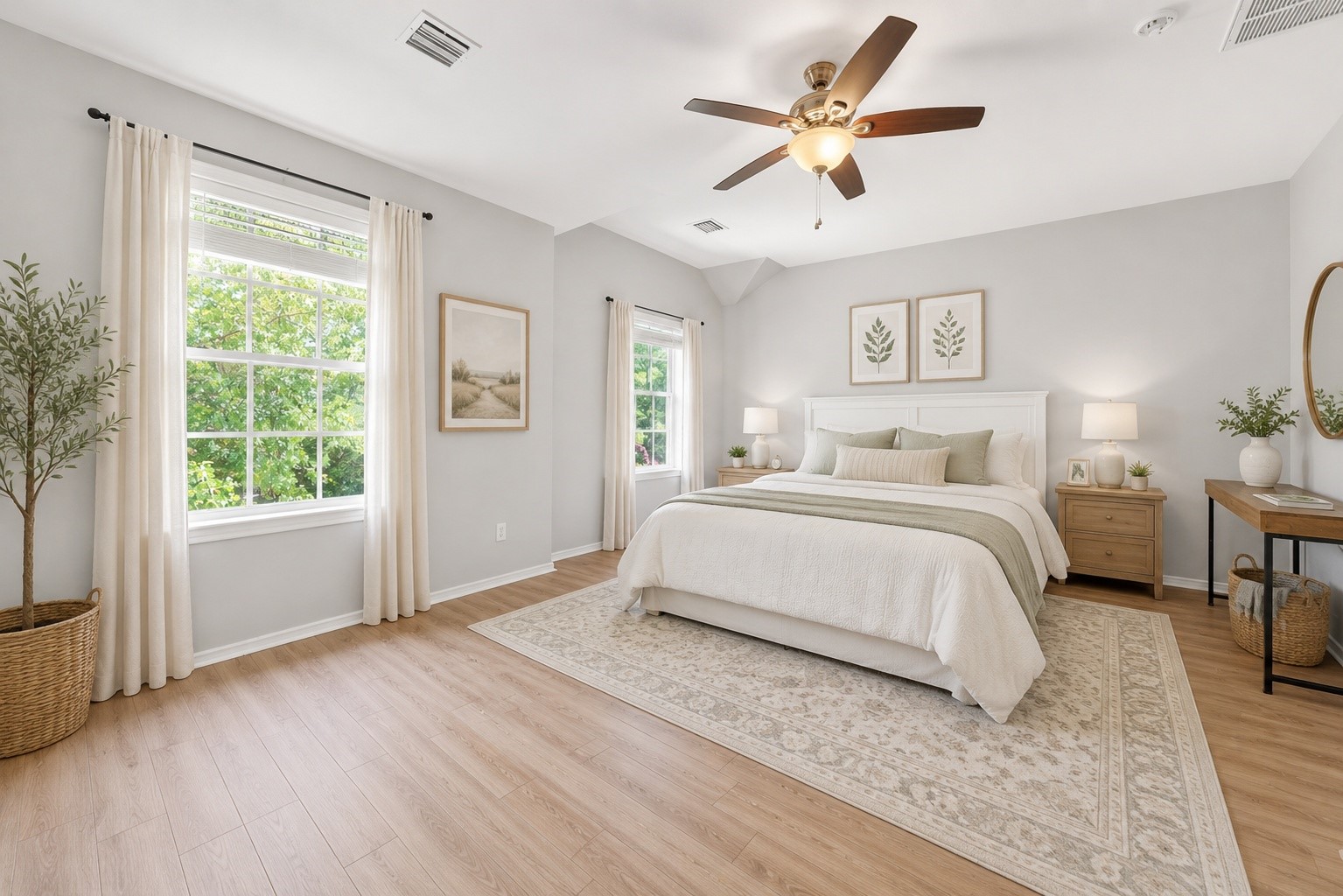 38 Musgrove Place Spring, TX 77382 - Photo 15 of 36 Sunlit primary bedroom with vaulted ceiling, ceiling fan, and oversized windows overlooking leafy views.