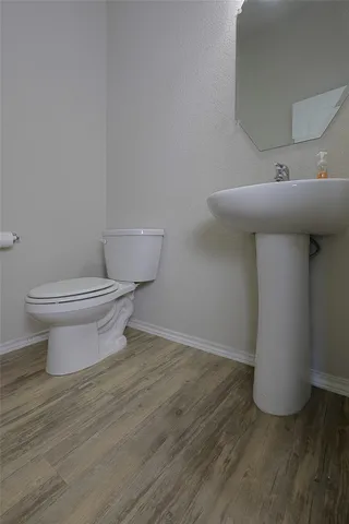 a view of a livingroom with a chandelier fan