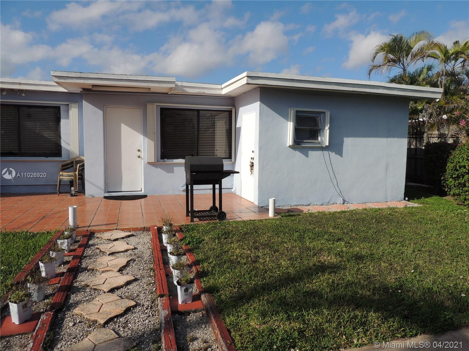 Westwood Lakes Miami, FL 33165 - Photo 29 of 29 a house view with a garden space