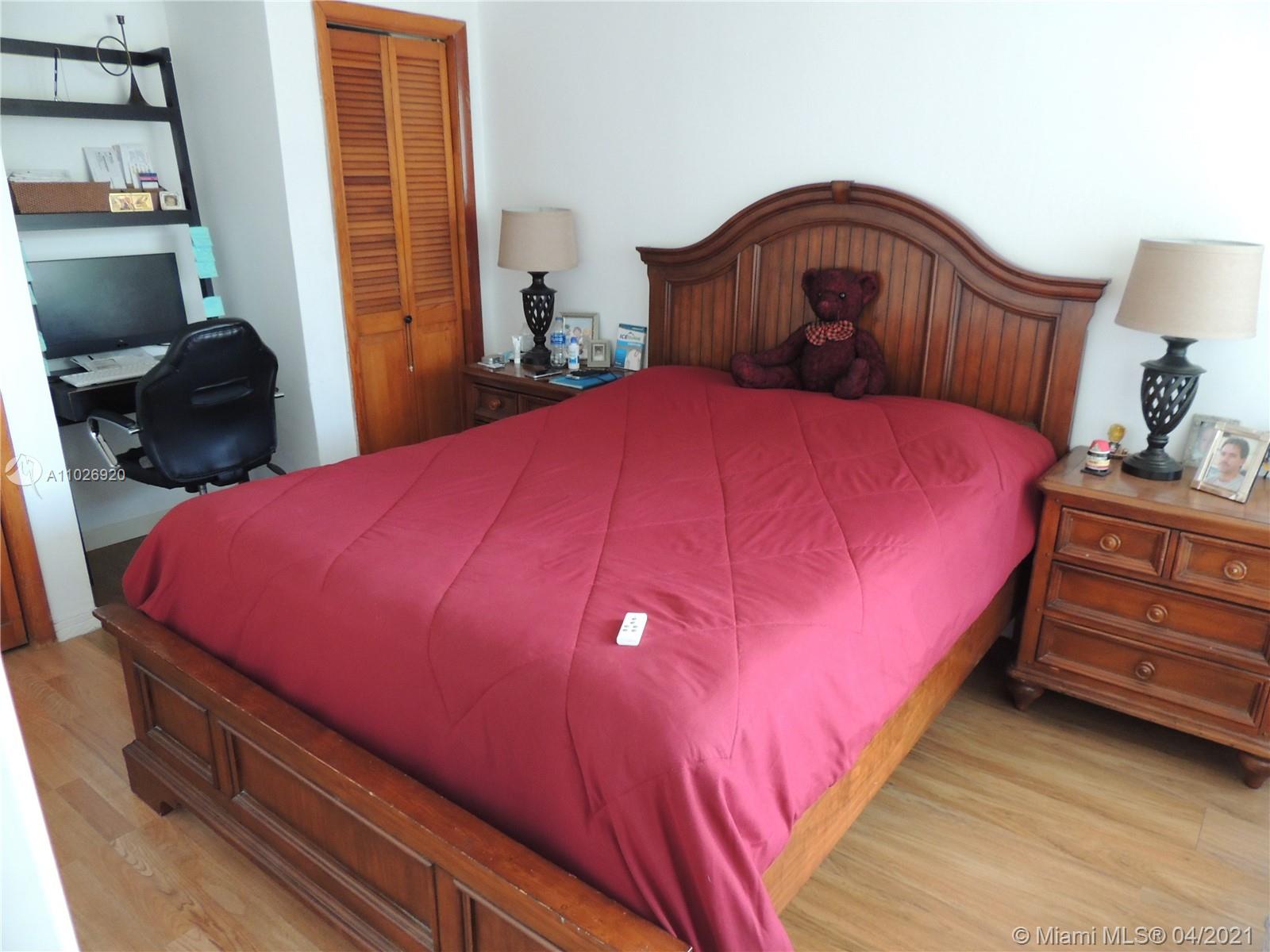 Westwood Lakes Miami, FL 33165 - Photo 9 of 29 a bedroom with a bed and a dresser