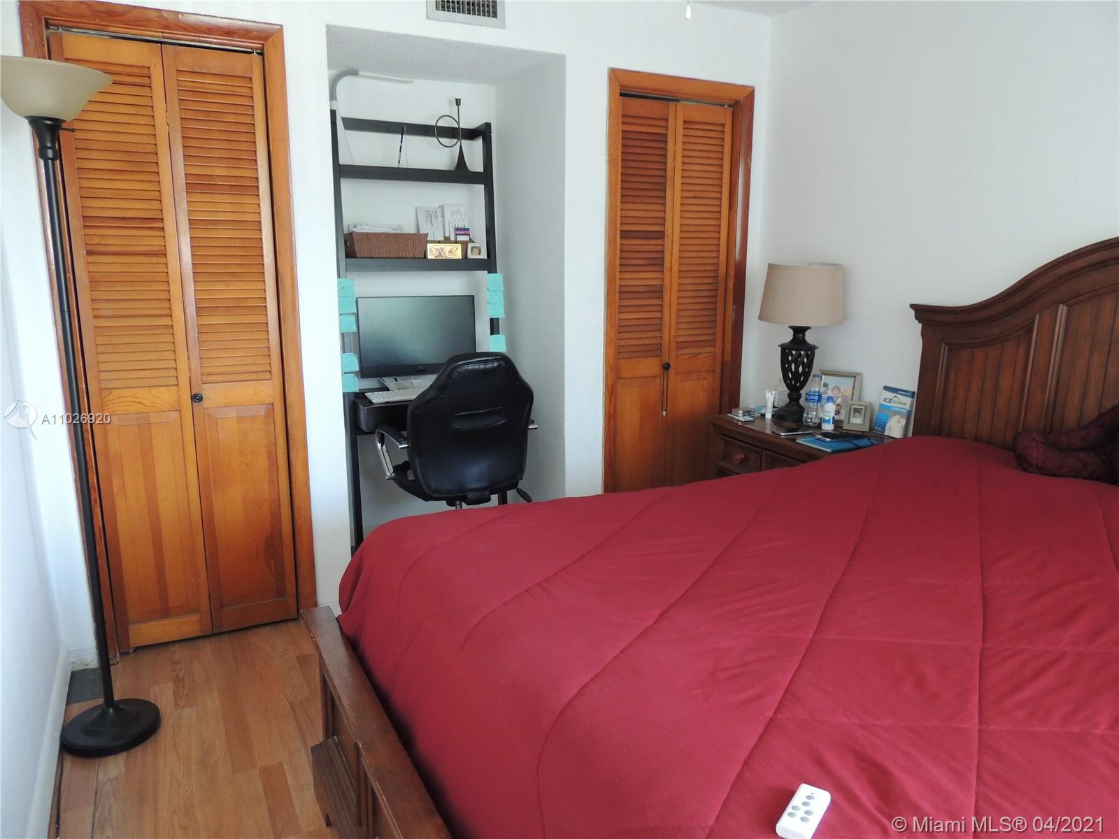 Westwood Lakes Miami, FL 33165 - Photo 10 of 29 a bedroom with a bed and a window