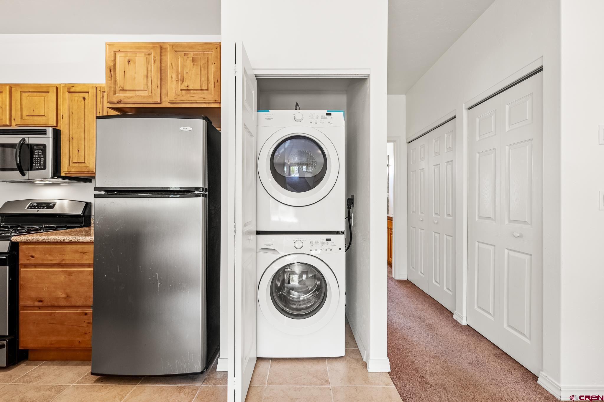 33 Cedar Ridge Way, Unit 3 Durango, CO 81301 - Photo 12 of 31 a utility room with dryer and washer