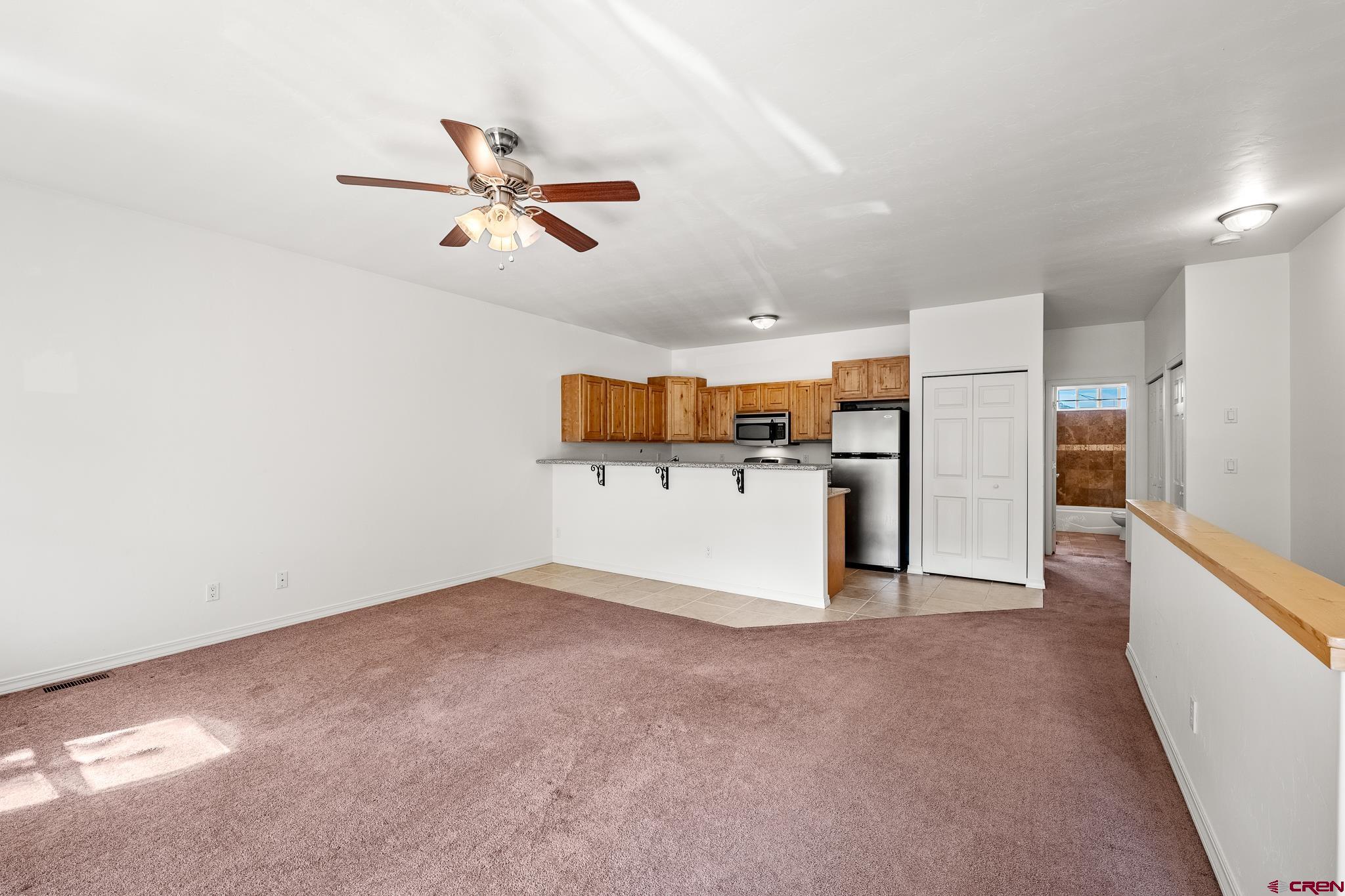 33 Cedar Ridge Way, Unit 3 Durango, CO 81301 - Photo 13 of 31 a view of a kitchen with a sink