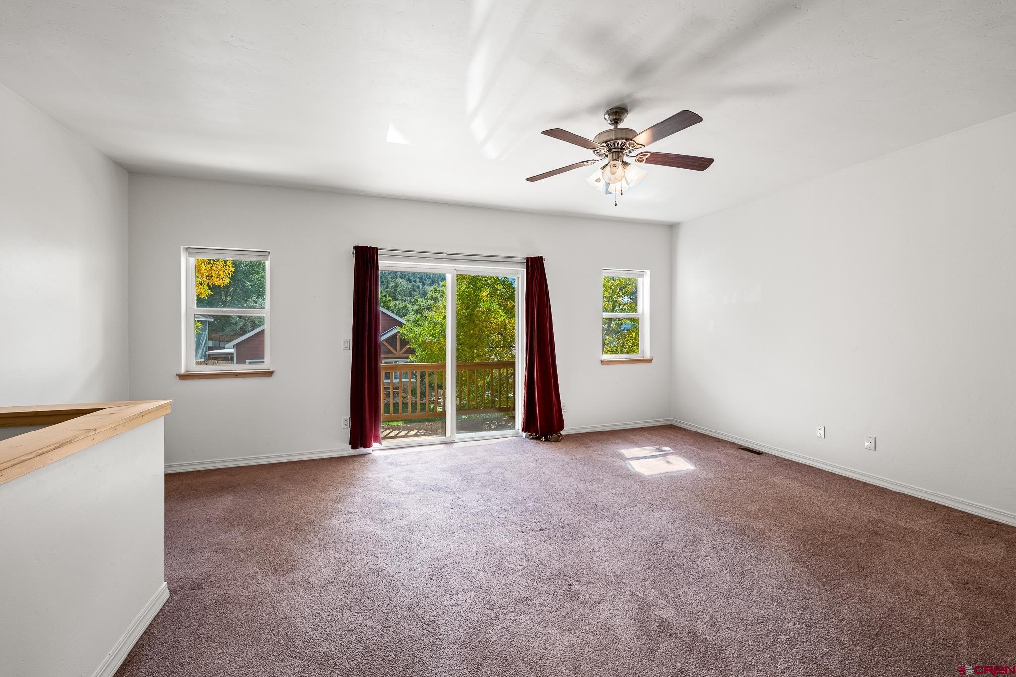 33 Cedar Ridge Way, Unit 3 Durango, CO 81301 - Photo 14 of 31 a view of an empty room with a window