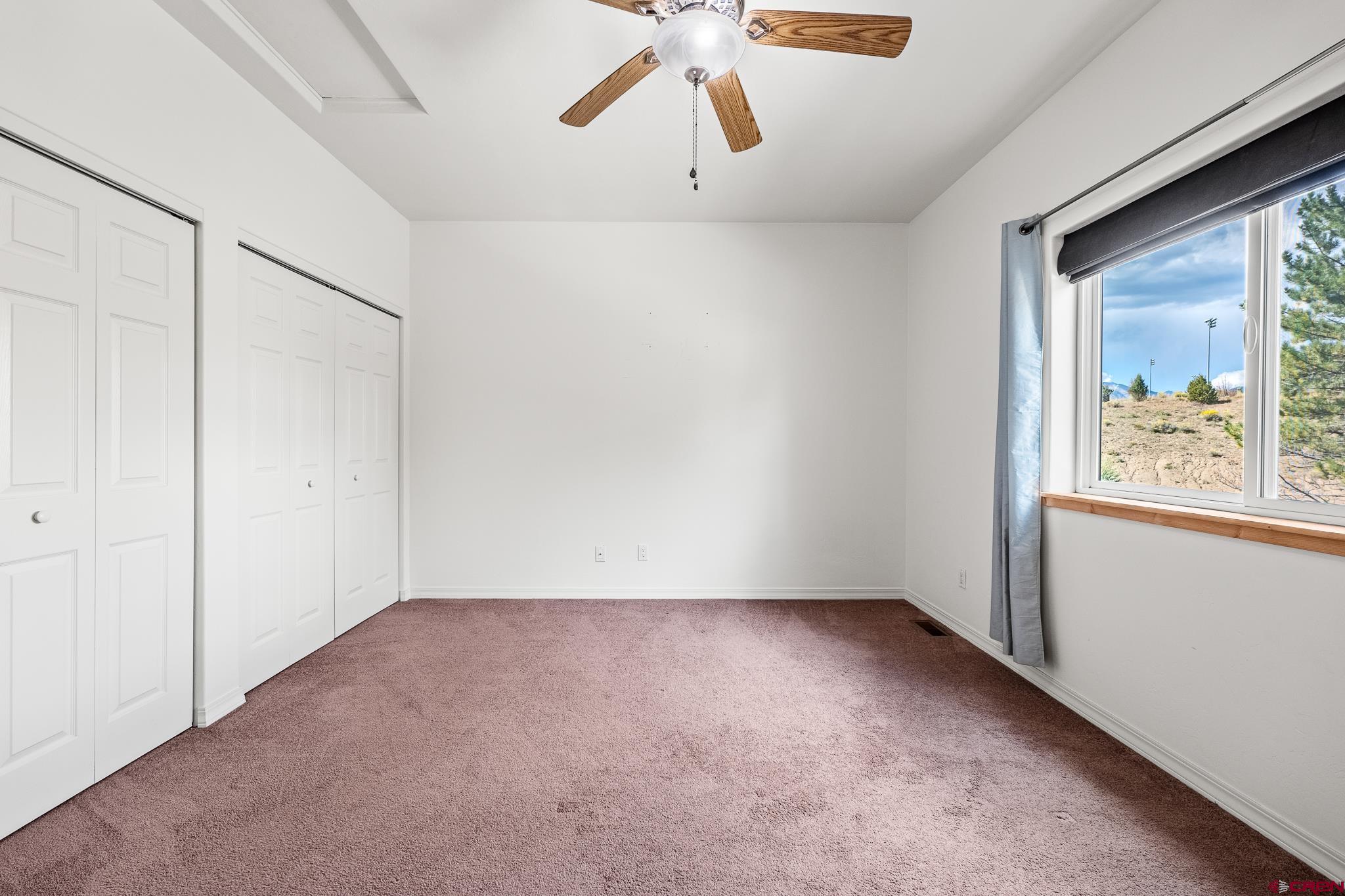 33 Cedar Ridge Way, Unit 3 Durango, CO 81301 - Photo 21 of 31 a view of an empty room with a window